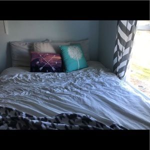 blue dandelion flower throw pillow